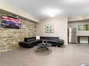 a living room with a couch and a table
